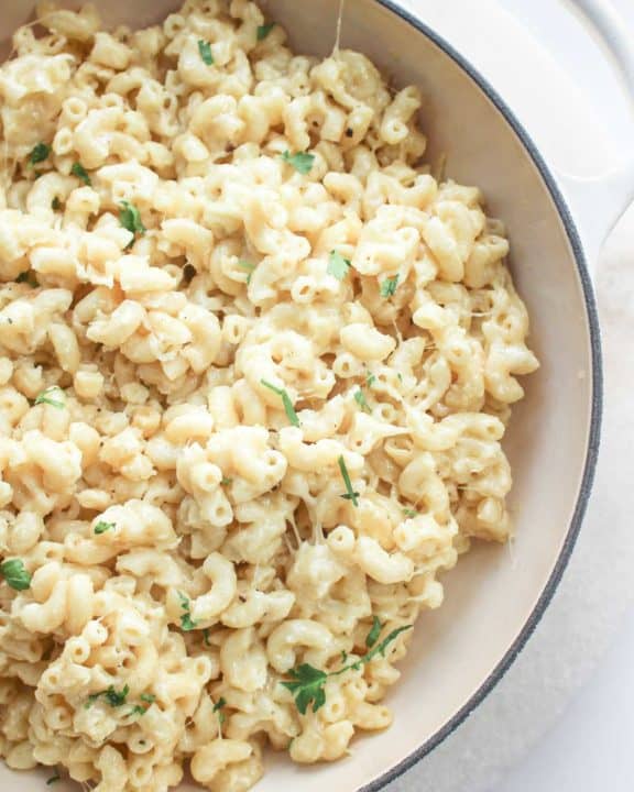 overhead view of white cheddar mac and cheese in a serving dish