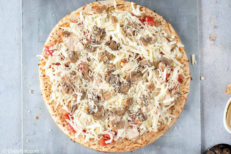 Olive Garden chicken formaggio pizza before being baked