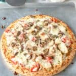 homemade Olive Garden chicken formaggio pizza on a baking sheet