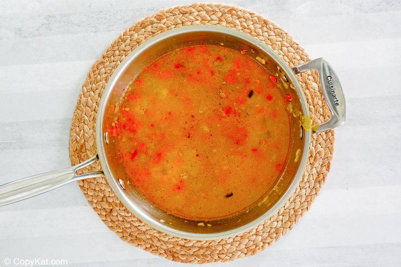 vegetable stock for black bean soup in a pot