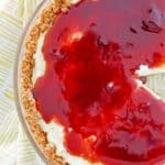 overhead view of homemade Pappadeaux key lime pie with raspberry sauce