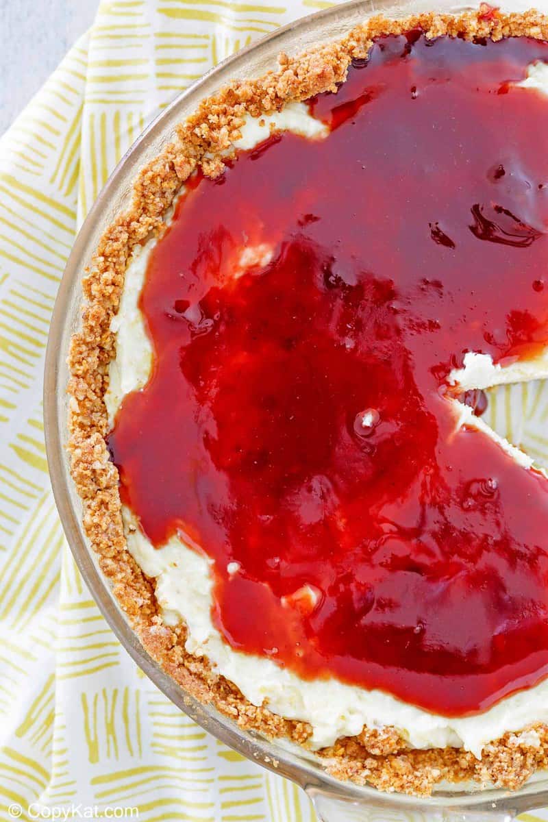 overhead view of homemade Pappadeaux key lime pie with raspberry sauce