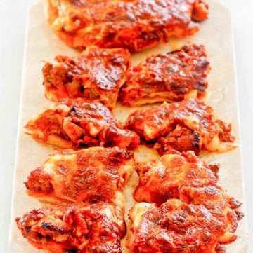 pizza burgers on a marble platter