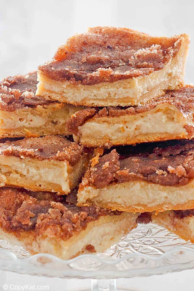 a stack of sopapilla cheesecake slices