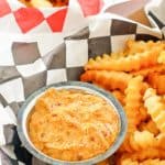 a bowl of homemade Whataburger creamy pepper sauce and fries in a basket