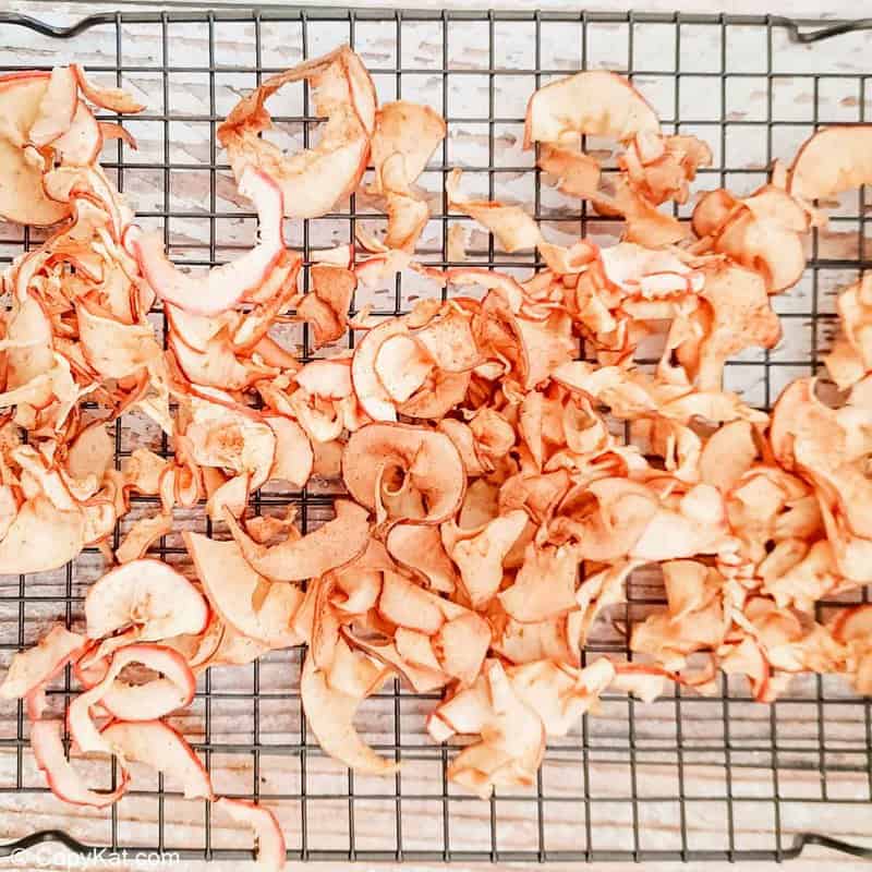 air fried apple chips on a wire rack