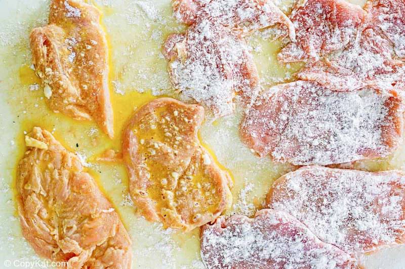 chicken cutlets dipped in egg wash and coated with flour