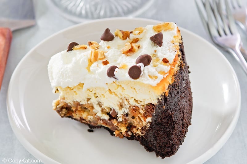 a slice of cookie dough cheesecake on a plate
