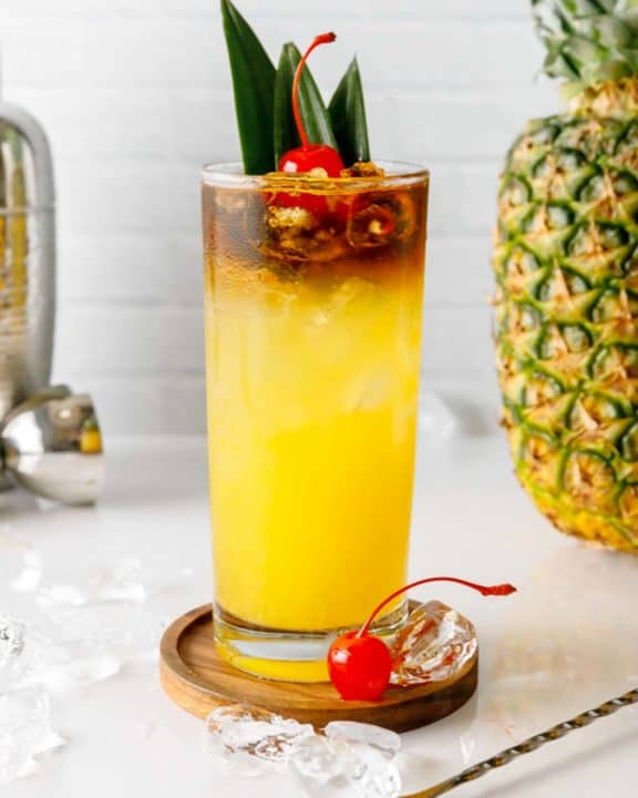 homemade PF Chang Mai Tai, pineapple, and cocktail shaker