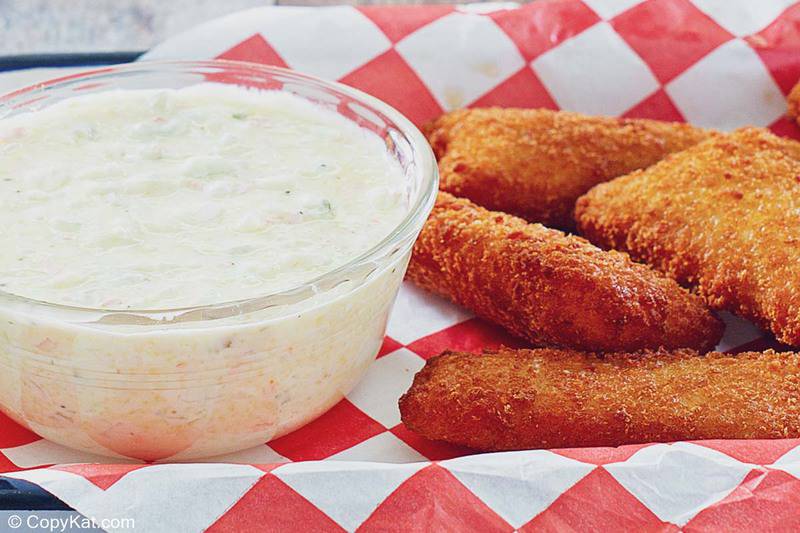 a bowl of homemade Red Lobster tartar sauce and fried fish