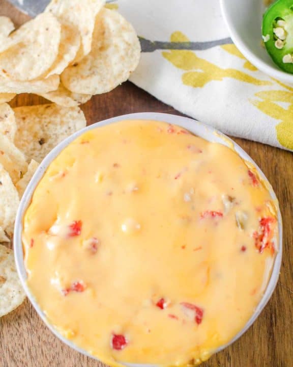 rotel dip in a bowl and tortilla chips