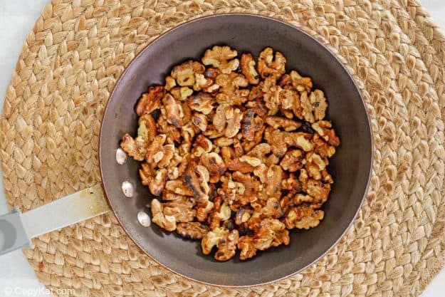 toasted walnuts in a skillet