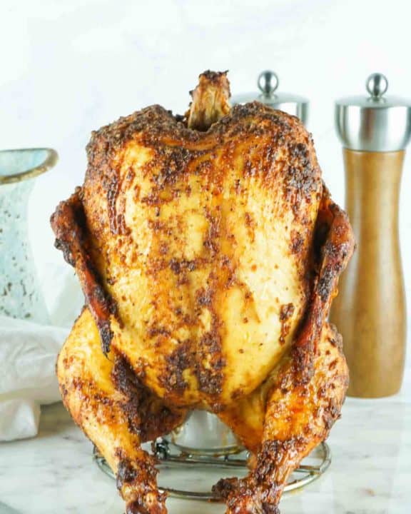 smoked beer can chicken on a holder