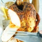 carving slices from smoked beer can chicken