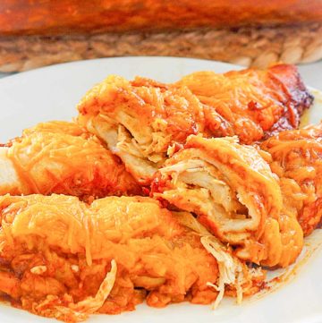 sour cream chicken enchiladas on a plate