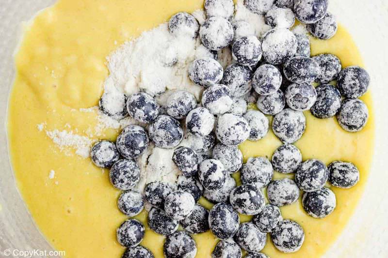 homemade Starbucks blueberry muffin batter with floured blueberries on top