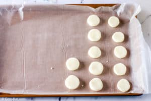 peppermint candy patties on a baking sheet
