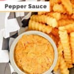a bowl of creamy pepper sauce with french fries