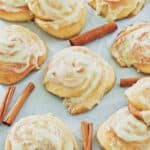 cream cheese frosted cinnamon rolls and cinnamon sticks