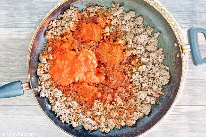 browned ground beef and chili colorado spices in a skillet
