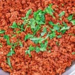 overhead view of chili colorado con carne in a skillet