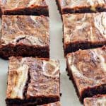 cream cheese brownies on parchment paper