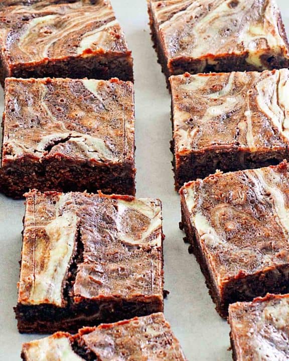 cream cheese brownies on parchment paper