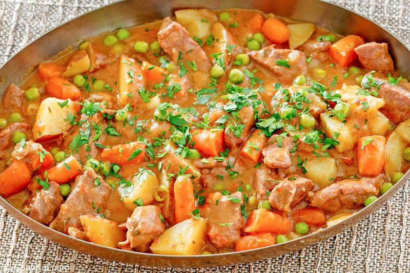 lamb stew with potatoes, carrots, and peas