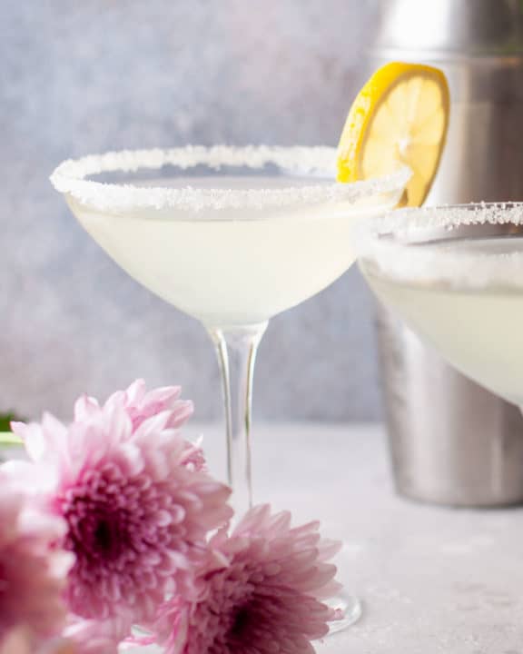 lemon drop martini garnished with a lemon slice