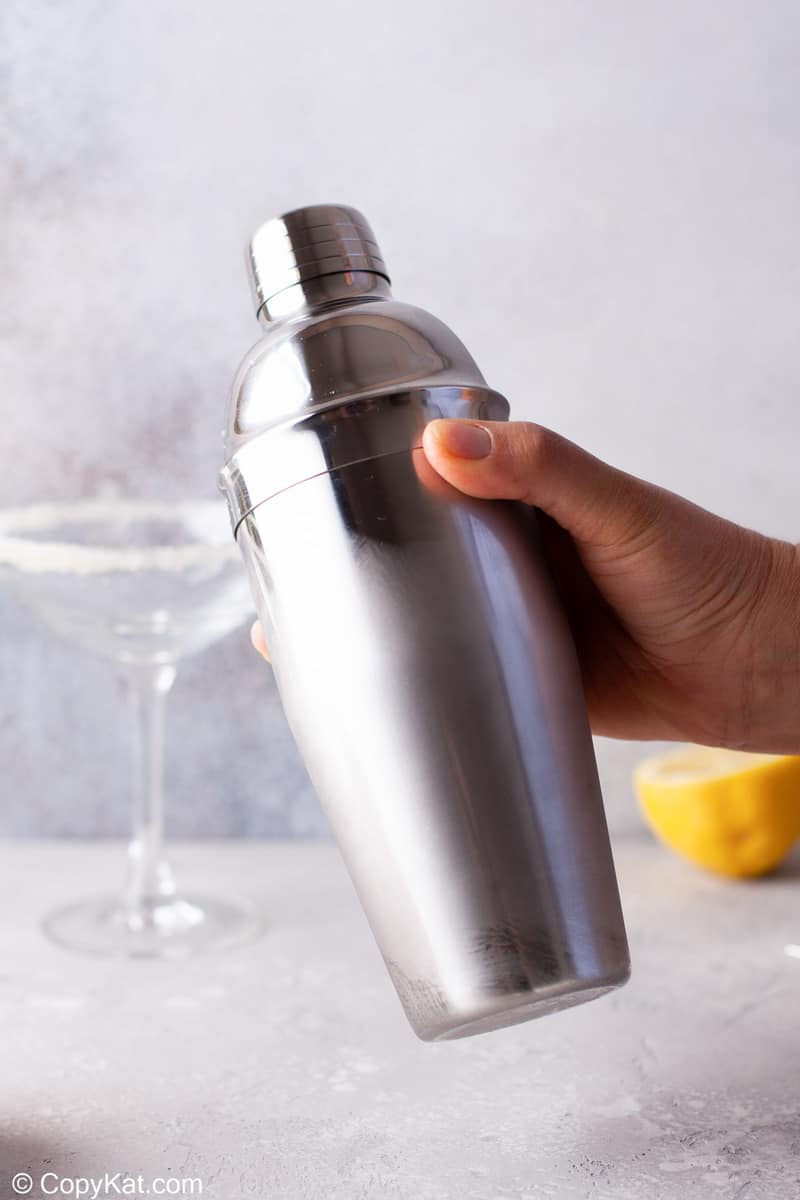shaking a cocktail shaker