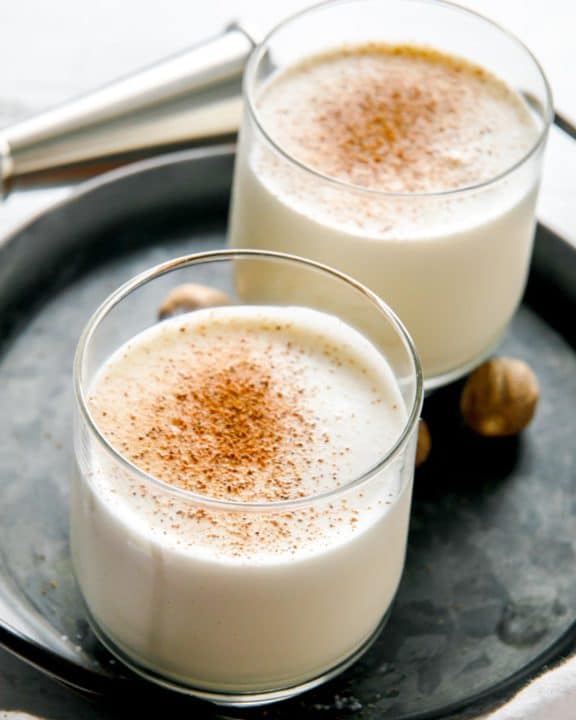 two glasses of milk punch on a tray