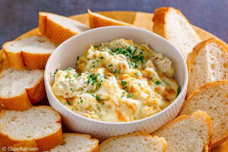 homemade Olive Garden angry alfredo with chicken and bread slices