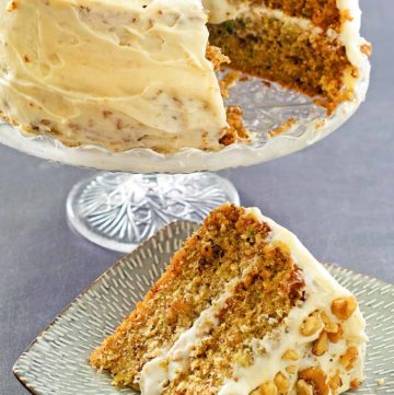 zucchini cake on a cake stand and a slice on a plate