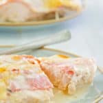 two servings on chicken cordon bleu casserole on plates.