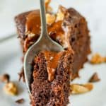 a piece of chocolate bundt cake on a spoon.