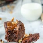 a slice of chocolate bundt cake and a glass of milk