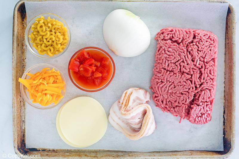 ground beef casserole ingredients on a baking sheet.