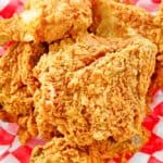 overhead view of homemade KFC fried chicken on parchment paper