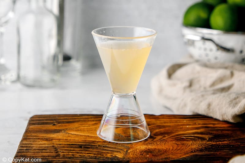 sour mix in a jigger