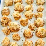 a tray of sausage stuffed mushrooms.
