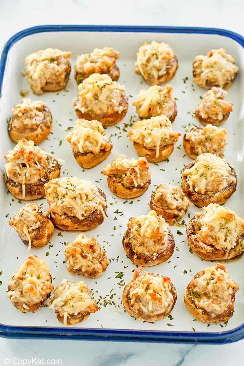 a tray of sausage stuffed mushrooms.