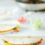 two homemade Taco Bell soft tacos and a skillet