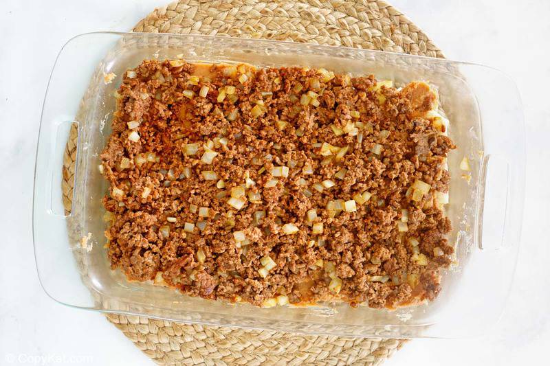 taco casserole seasoned ground beef and onions layer