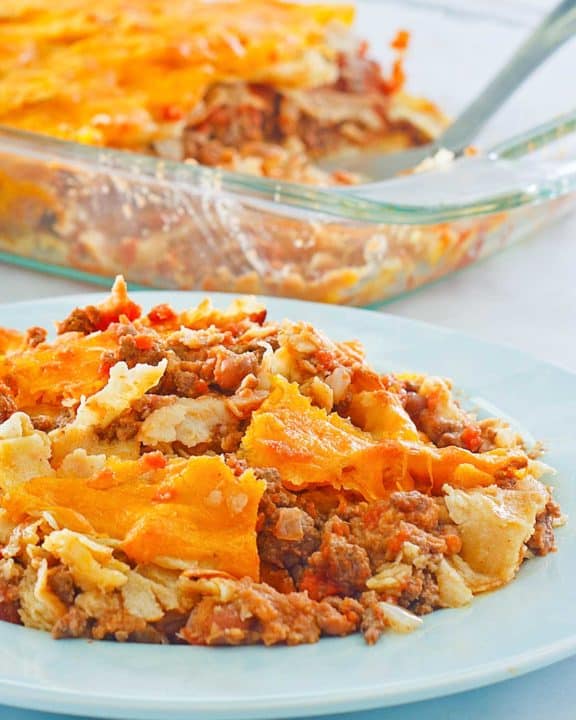 taco casserole on a plate and in a baking dish