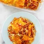 taco casserole in a baking dish and on a plate