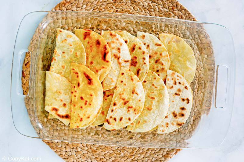 fried tortillas in a baking dish