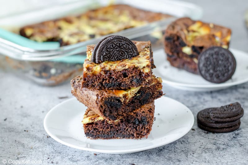 Oreo brownies on plates and in a baking dish