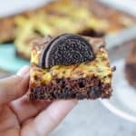 hand holding an Oreo brownie