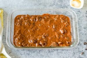 Oreo brownies batter in a baking dish