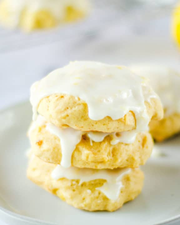 three pineapple cookies stacked on a plate